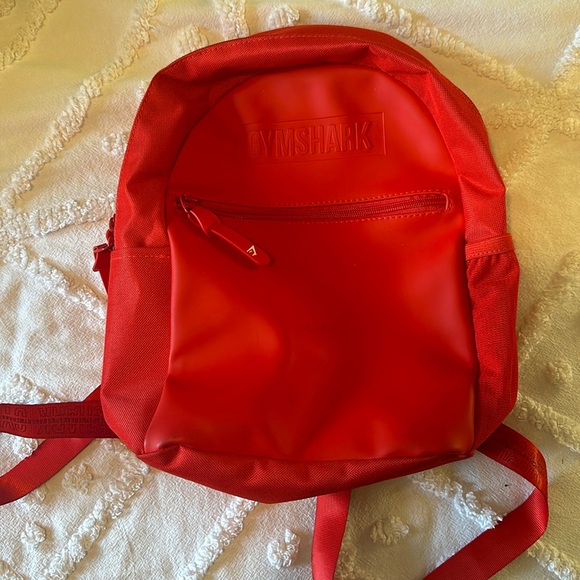 Gymshark Handbags - Red gym shark mini back pack